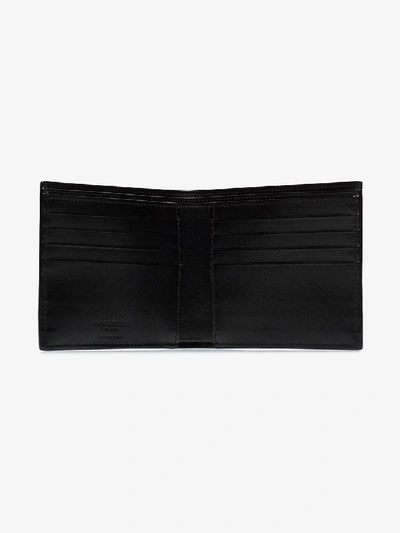 Shop Saint Laurent Black Star Print Leather Bifold Wallet
