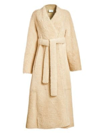 Shop The Row Tanilo Shearling Wrap Coat In Sand