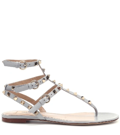 Shop Valentino Rockstud Leather Sandals In Grey