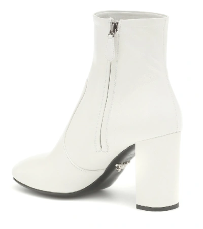 Shop Prada Madras Leather Ankle Boots In White