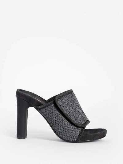 Shop Yeezy Sandals In Black