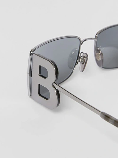 Shop Burberry ‘b' Lens Detail Rectangular Frame Sunglasses In Gunmetal Grey