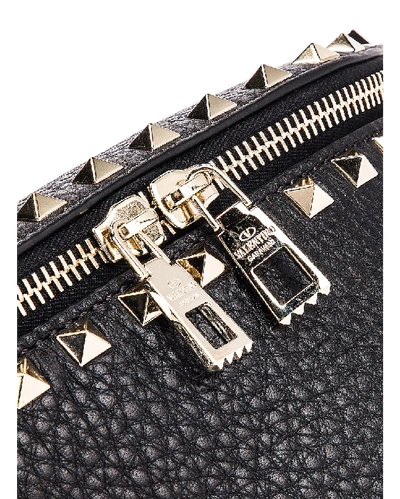 Shop Valentino Rockstud Belt Bag In Black