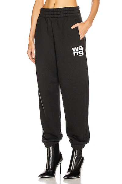 Shop Alexander Wang T T By Alexander Wang Logo Print Pants In Black