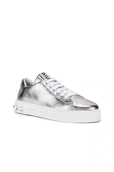 Shop Miu Miu Jeweled Sneakers In Silver