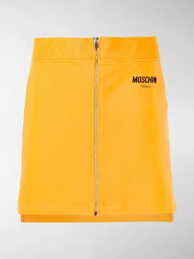 Shop Moschino Zip Front Mini Skirt In Yellow