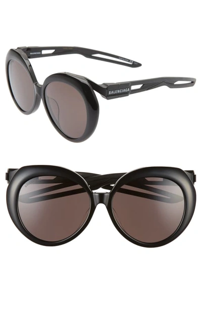 Shop Balenciaga 56mm Round Sunglasses In Shiny Black/ Grey