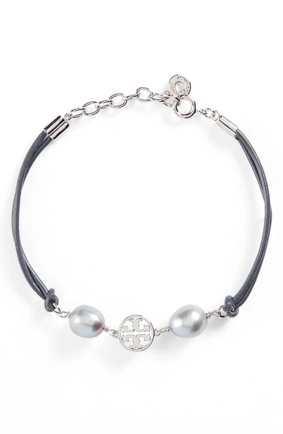 Shop Tory Burch Logo Pearl Bracelet In Tory Silver/ Light Gray
