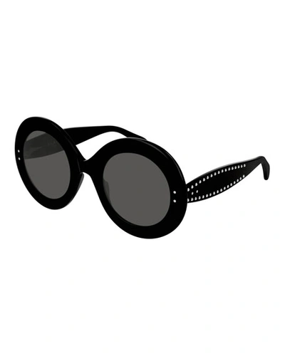 Shop Alaïa Round Studded Acetate Sunglasses In Black