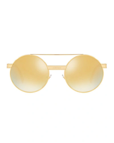Shop Versace Round Metal Sunglasses In Gold