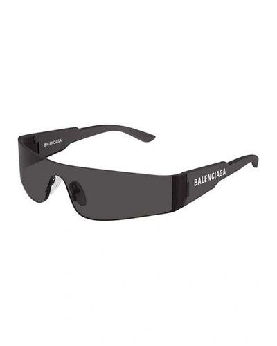 Shop Balenciaga Mirrored Rimless Wrap Sunglasses In Gray