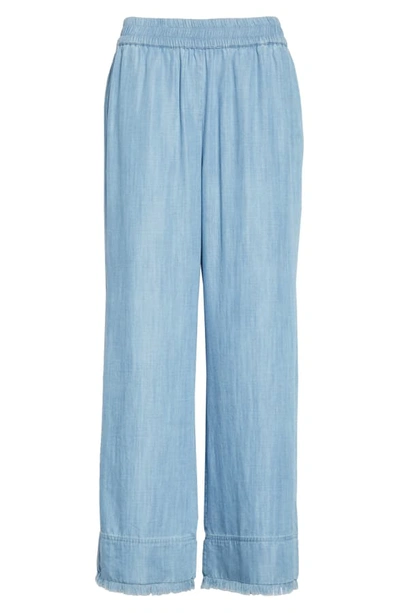 Shop Alice And Olivia Benny Frayed Ankle Wide Leg Pants In Medium Chambray