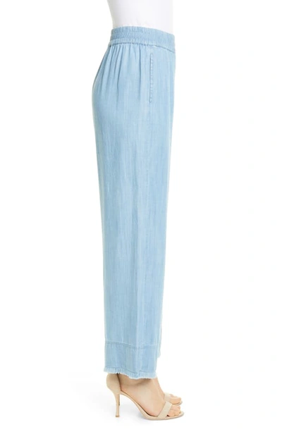 Shop Alice And Olivia Benny Frayed Ankle Wide Leg Pants In Medium Chambray