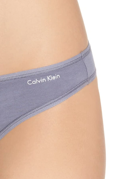 Shop Calvin Klein Form Thong In Blue Granite