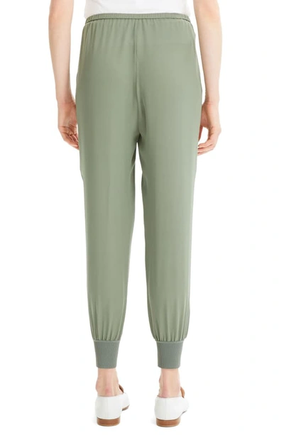 Shop Theory Silk Jogger Pants In Faded Sage