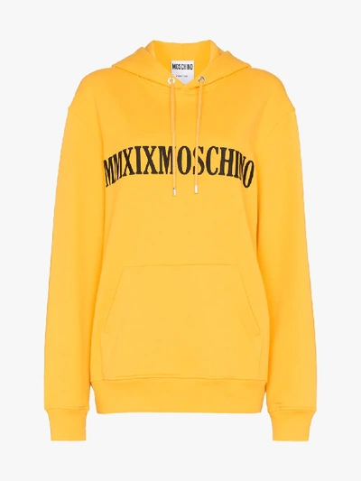 Shop Moschino Embroidered Logo Oversized Hoodie In Yellow