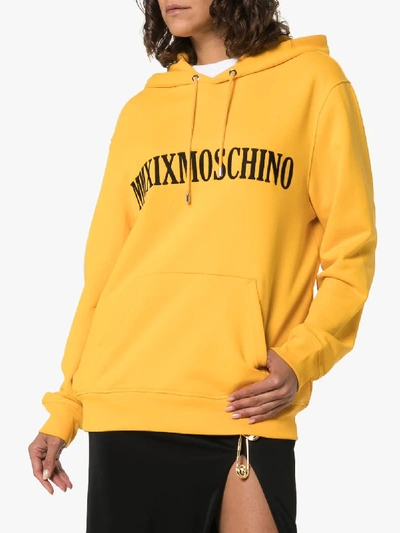 Shop Moschino Embroidered Logo Oversized Hoodie In Yellow