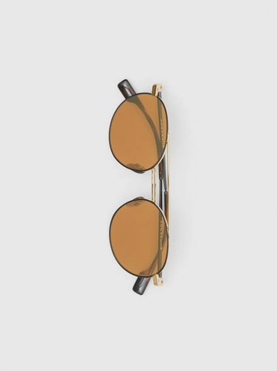 Shop Burberry Top Bar Detail Round Frame Sunglasses In Tortoiseshell