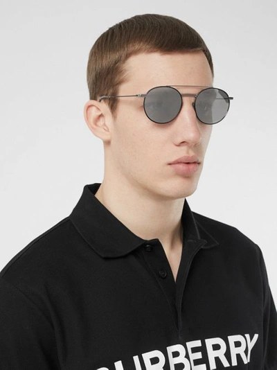 Shop Burberry Top Bar Detail Round Frame Sunglasses In Gunmetal Grey