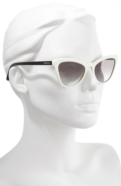 Shop Prada 56mm Cat Eye Sunglasses In White/ Grey Gradient