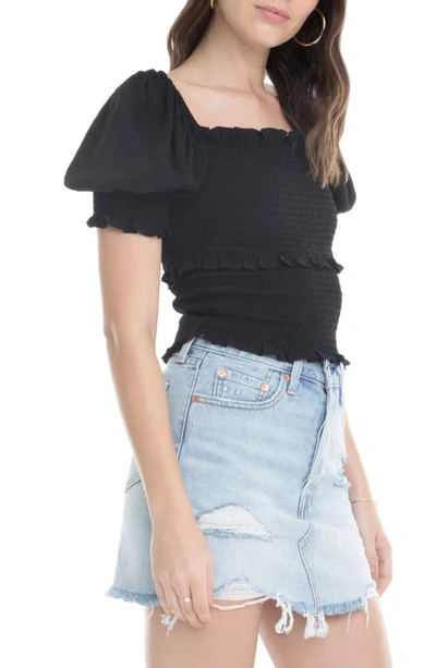 Shop Astr Glenna Smocked Puff Sleeve Top In Black