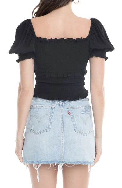 Shop Astr Glenna Smocked Puff Sleeve Top In Black