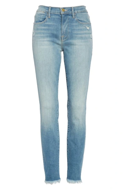 Shop Frame Le High Ripped Ankle Skinny Jeans In Muse