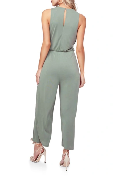 Shop Astr Easy Twist Waist Jumpsuit In Sage