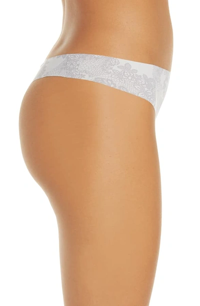Shop Calvin Klein Invisibles Thong In Delicate Lace