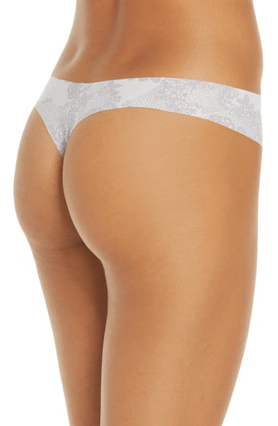 Shop Calvin Klein Invisibles Thong In Delicate Lace