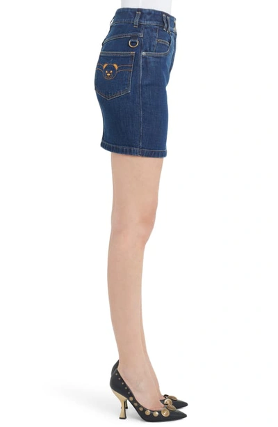 Shop Moschino Embroidered Bear Denim Miniskirt In Blue