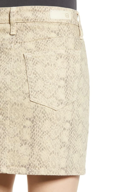 Shop Ag Vera Snake Print Denim Miniskirt In Silk Python Fresh Sand