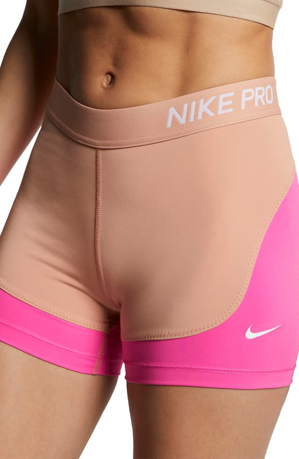 gold nike pro shorts