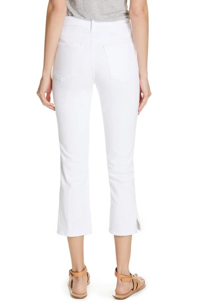 Shop Frame Le Sylvie Slit Hem Ankle Slim Jeans In Blanc
