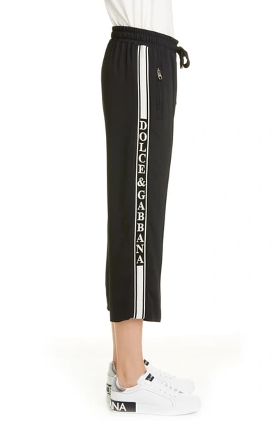 Shop Dolce & Gabbana Logo Tape Crop Track Pants In Black