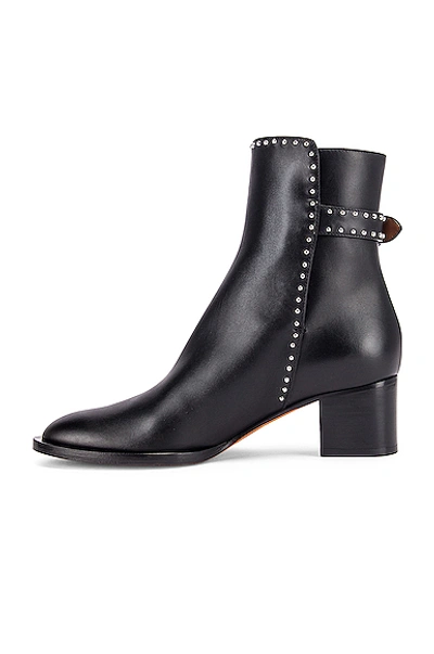 Shop Givenchy Elegant Studs Ankle Boots In Black