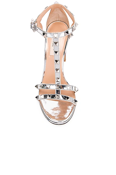 Shop Valentino Rockstud Strap Heels In Silver
