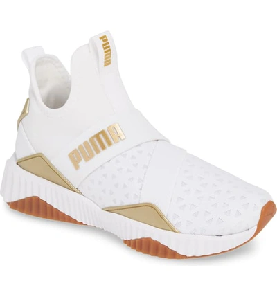 Shop Puma Defy Mid Sparkle Training Shoe In  White/ Metallic Gold