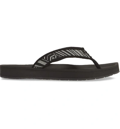 Shop Minnetonka Hedy Flip Flop In Black/ White Stripe