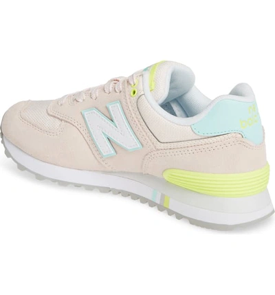 New Balance Women s 574 Casual Sneakers From Finish Line In Pink Mist light Reef ModeSens