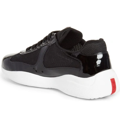 Shop Prada Low Top Sneaker In Black/ White