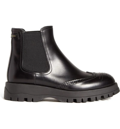 Shop Prada Lug Sole Chelsea Boot In Black Leather