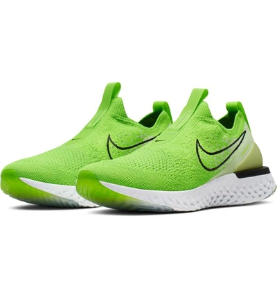 Shop Nike Epic React Flyknit Running Shoe In Electric Green/ Black/ Violet
