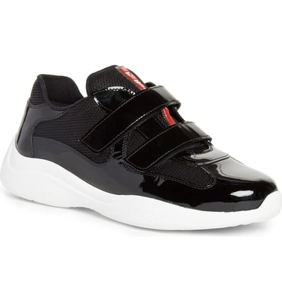 Shop Prada Low Top Sneaker In Black/ White