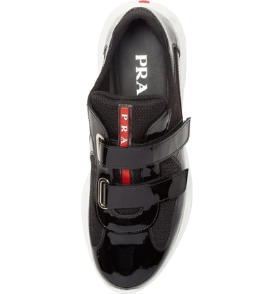 Shop Prada Low Top Sneaker In Black/ White