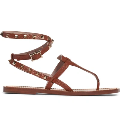 Shop Valentino Rockstud Ankle Wrap Thong In Cognac