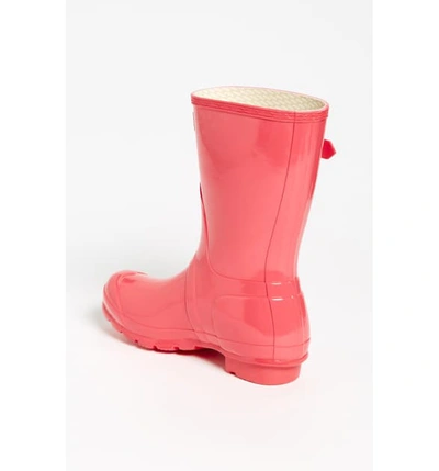 Shop Hunter Original Short Gloss Waterproof Rain Boot In Crimson Pink