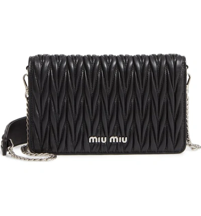 Shop Miu Miu Matelasse Flap Crossbody Bag In Nero