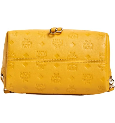 Shop Mcm Essential Monogram Leather Small Backpack - Yellow In Golden Mango