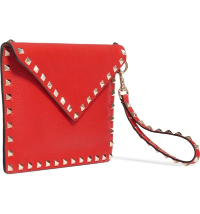 Shop Valentino Medium Rockstud Leather Envelope Pouch In Rouge Pur